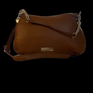 DKNY caramel colored hobo bag. New but no tags. Comes with dust bag.